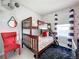 bedroom with bunk bed and Mickey Mouse decor at 8030 King Palm Cir, Kissimmee, FL 34747