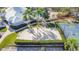 Aerial view of community amenities including a volleyball court, basketball court, and parking at 8030 King Palm Cir, Kissimmee, FL 34747