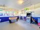 Game room with foosball and arcade game at 8030 King Palm Cir, Kissimmee, FL 34747