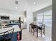Modern kitchen with stainless steel appliances and breakfast nook at 8030 King Palm Cir, Kissimmee, FL 34747