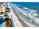 Stunning ocean view from an aerial perspective, showing beach and waves at 830 Hope Ave, New Smyrna Beach, FL 32169