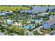 Community features multiple pools, a lake, and palm trees at 9085 Yonath St, Orlando, FL 32827