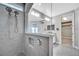 Spa-like bathroom with a large walk-in shower and double shower heads at 9085 Yonath St, Orlando, FL 32827