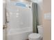 Bathroom with a shower/tub combo, and neutral color scheme at 9085 Yonath St, Orlando, FL 32827