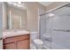Clean bathroom with a walk-in shower and single sink vanity at 9085 Yonath St, Orlando, FL 32827