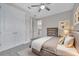 Spacious bedroom with a large bed, plenty of closet space and neutral tones at 9085 Yonath St, Orlando, FL 32827