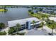 Aerial view of a community clubhouse near a lake at 9085 Yonath St, Orlando, FL 32827
