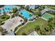 Aerial view of community pool, sand volleyball, and basketball court at 9085 Yonath St, Orlando, FL 32827