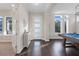 Bright and spacious entryway with hardwood floors and a pool table at 9085 Yonath St, Orlando, FL 32827