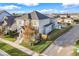 Two-story house with gray siding, fenced backyard, and attached garage at 9085 Yonath St, Orlando, FL 32827