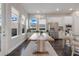 Kitchen breakfast area with farmhouse table and natural light at 9085 Yonath St, Orlando, FL 32827