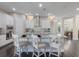 Modern kitchen island with seating for four, perfect for casual dining at 9085 Yonath St, Orlando, FL 32827