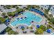 Aerial view of a community lap pool with lounge areas at 9085 Yonath St, Orlando, FL 32827