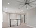 Spacious loft area with high ceilings and a ceiling fan at 9085 Yonath St, Orlando, FL 32827