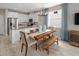 Modern kitchen with white cabinets, gray countertops, and stainless steel appliances at 9843 Walkway Dr, Orlando, FL 32832