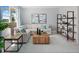 Spacious living room with large sectional sofa and stylish shelving at 9843 Walkway Dr, Orlando, FL 32832