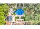 Aerial view of luxurious pool and surrounding landscape at 1120 Preserve Point Dr, Winter Park, FL 32789