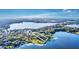 Aerial view showing property and lakefront lot at 1120 Preserve Point Dr, Winter Park, FL 32789