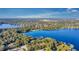 Lakefront property with expansive views and lush surroundings at 1120 Preserve Point Dr, Winter Park, FL 32789