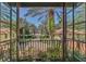 Private balcony overlooking a beautifully landscaped courtyard at 1120 Preserve Point Dr, Winter Park, FL 32789