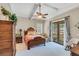 Charming bedroom with antique wooden bed and private balcony at 1120 Preserve Point Dr, Winter Park, FL 32789
