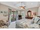 Spacious bedroom with large windows and private balcony access at 1120 Preserve Point Dr, Winter Park, FL 32789