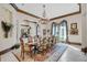 Formal dining room with chandelier and ornate furniture at 1120 Preserve Point Dr, Winter Park, FL 32789