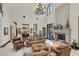 Open great room with fireplace, high ceilings, and kitchen views at 1120 Preserve Point Dr, Winter Park, FL 32789