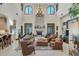 Grand great room featuring high ceilings, fireplace and ample seating at 1120 Preserve Point Dr, Winter Park, FL 32789