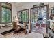 Bright home office with built-in desk and sunroom access at 1120 Preserve Point Dr, Winter Park, FL 32789