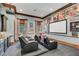 Elegant home theater with projector, seating, and movie posters at 1120 Preserve Point Dr, Winter Park, FL 32789