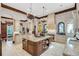 Gourmet kitchen with large island, custom cabinetry, and granite countertops at 1120 Preserve Point Dr, Winter Park, FL 32789