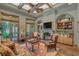 Cozy living room with fireplace, built-ins, and hardwood floors at 1120 Preserve Point Dr, Winter Park, FL 32789