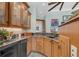 Well-equipped wet bar with granite countertop at 1120 Preserve Point Dr, Winter Park, FL 32789
