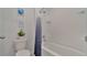 Clean bathroom with a bathtub and shower at 1261 Limbali St, Mount Dora, FL 32757