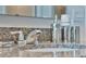 Modern bathroom sink with granite countertop and chrome faucet at 1261 Limbali St, Mount Dora, FL 32757