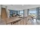 Spacious kitchen island with granite countertop at 1261 Limbali St, Mount Dora, FL 32757