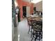 Kitchen and dining area featuring a breakfast bar and laundry area at 2122 King Richards Ct, Orange City, FL 32763