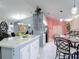 Open kitchen featuring a center island with pendant lighting and a view of the breakfast nook at 2122 King Richards Ct, Orange City, FL 32763
