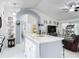 Eat-in kitchen features large island and pendant lighting at 2122 King Richards Ct, Orange City, FL 32763