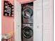 Conveniently located laundry closet features stacked washer and dryer at 2122 King Richards Ct, Orange City, FL 32763