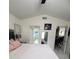Spacious main bedroom leading to bathroom and dining room at 2122 King Richards Ct, Orange City, FL 32763