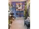 Bright sunroom featuring decor, plants, and a cat tree that creates a cozy and inviting atmosphere at 2122 King Richards Ct, Orange City, FL 32763