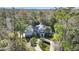 Luxury home nestled in wooded lot with circular driveway at 2229 Earleaf Ct, Longwood, FL 32779