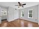 Bedroom with wood floors, double closets, and ceiling fan at 2229 Earleaf Ct, Longwood, FL 32779