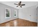 Bright bedroom with wood floors and ceiling fan at 2229 Earleaf Ct, Longwood, FL 32779