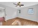 Spacious bedroom with wood floors and large windows at 2229 Earleaf Ct, Longwood, FL 32779