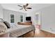 Main bedroom with wood floors and ensuite bath at 2229 Earleaf Ct, Longwood, FL 32779