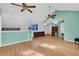 Bright bonus room with wood floors and vaulted ceilings at 2229 Earleaf Ct, Longwood, FL 32779