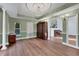 Bright dining room, hardwood floors, and built-in hutch at 2229 Earleaf Ct, Longwood, FL 32779